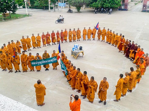 Cambodian monks gather in the town of Battambang to demand protection of Prey Lang forest.