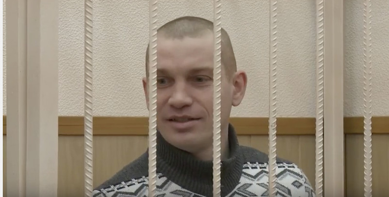 Vadim Tyumentsev in court as his verdict is being read. Screencap from YouTube video, courtesy of Radio Liberty.
