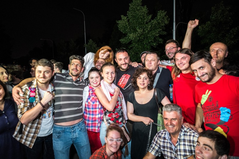 Group of Colorful Revolution protesters celebrating the release of Pavle Bogoevski (in the middle) from police custody. Photo by Vančo Džambaski, CC BY-NC-SA.