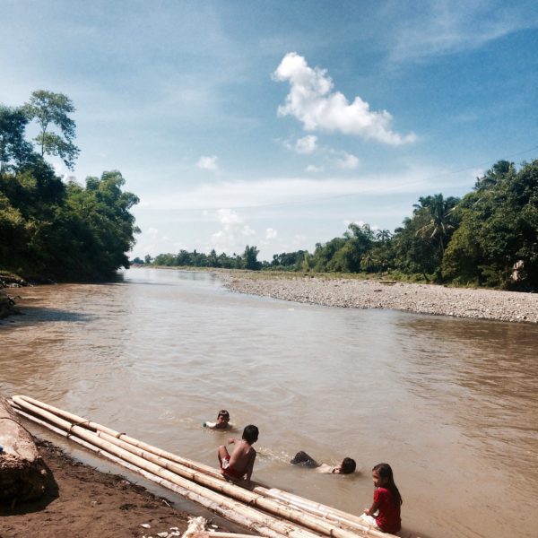 Children playing along the river banks of Jalaur in Barangay Agcalaga, Calinog.