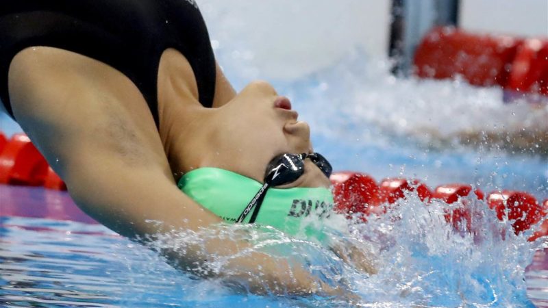 Gaurika Singh at Women's 100m backstroke Heat. Image by Al Bello, Getty Images. Used with permission from the Brazilian Olympic Committee.