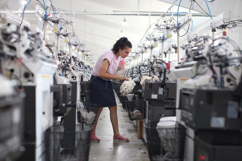 A woman at work at the huge glove factory in Choratan, a village near the Armenia and Azerbaijan border