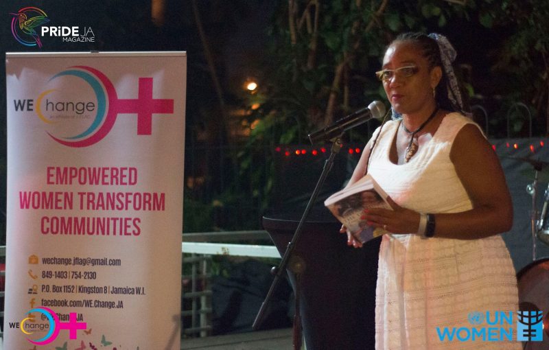 Tamika Pommells-Williams, a survivor of gender-based violence, speaks at the WE-Change "Orange Lights" event at Devon House in Kingston, on December 4, 2016. Photo by PRIDEja Magazine, used with permission. 