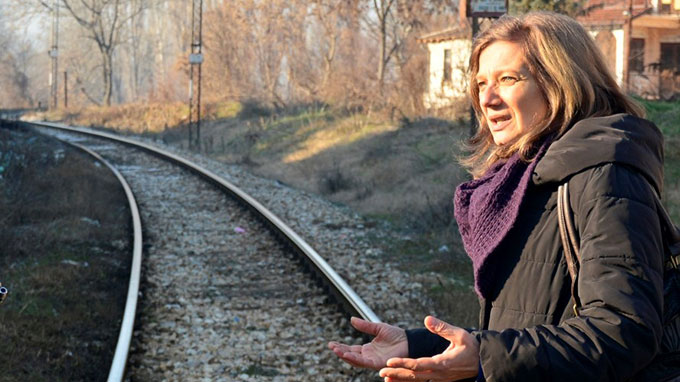 Lenče Zdravkin and the train tracks in Veles, Macedonia. Photo by Viktor Popovski/IKS, CC BY-NC-ND 3.0