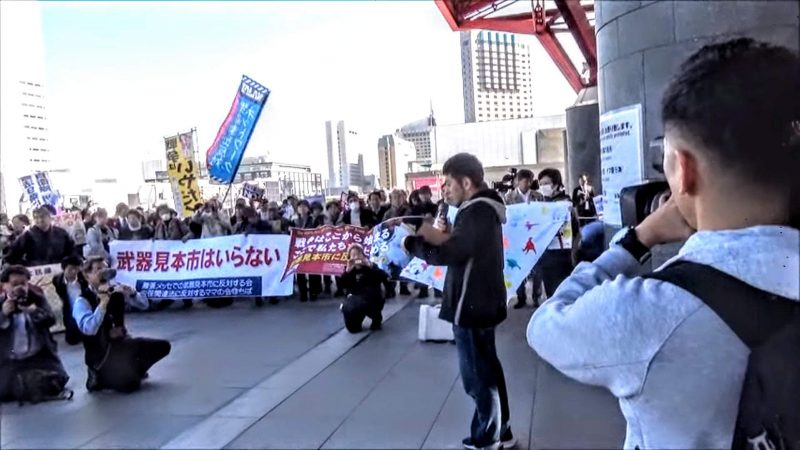 activists protesting Japan's first arms fair 