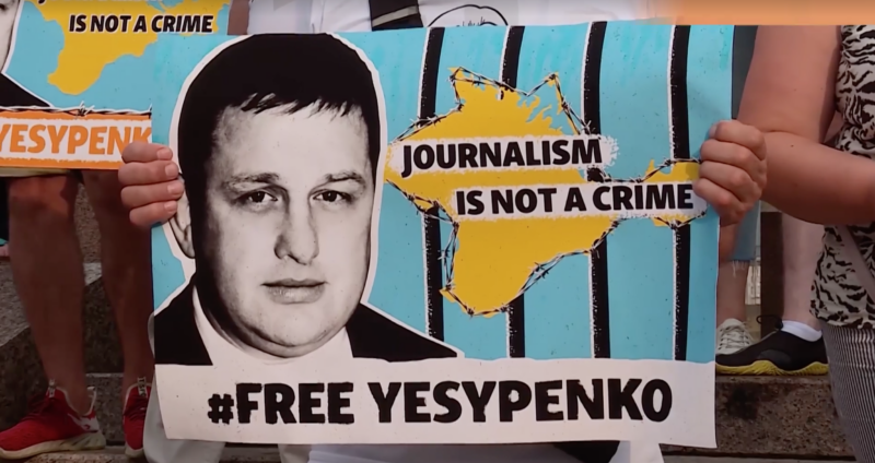 Protest in support of Vladyslav Yesypenko in Kyiv, Ukraine. Screenshot from video by Radio Free Europe/Radio Liberty. 