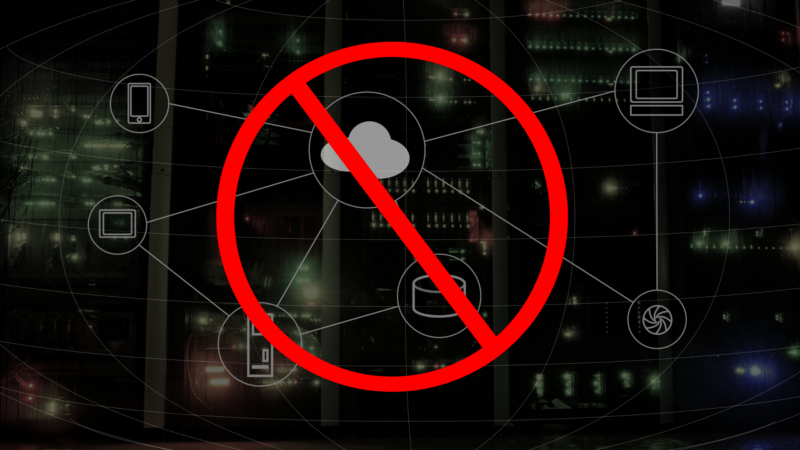 A dark background with images of circuits and networks in light grey, to represent the internet. in the middle is a large red circle with a slash through it, a forbidden sign