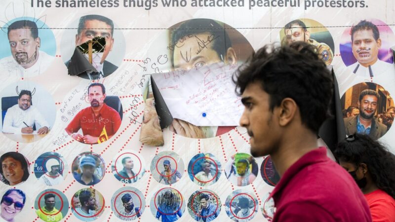 July 11th - A banner reminds protesters of the culprits responsible for an organised assault on Gotaogogama protesters under the blessings of then Prime Minister, Mahinda Rajapaksa