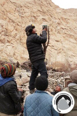 Parabraksh being installed outside a cattle enclosure in a village in Ladakh. Image credit: Snow Leopard Conservancy India Trust. Used with permission.