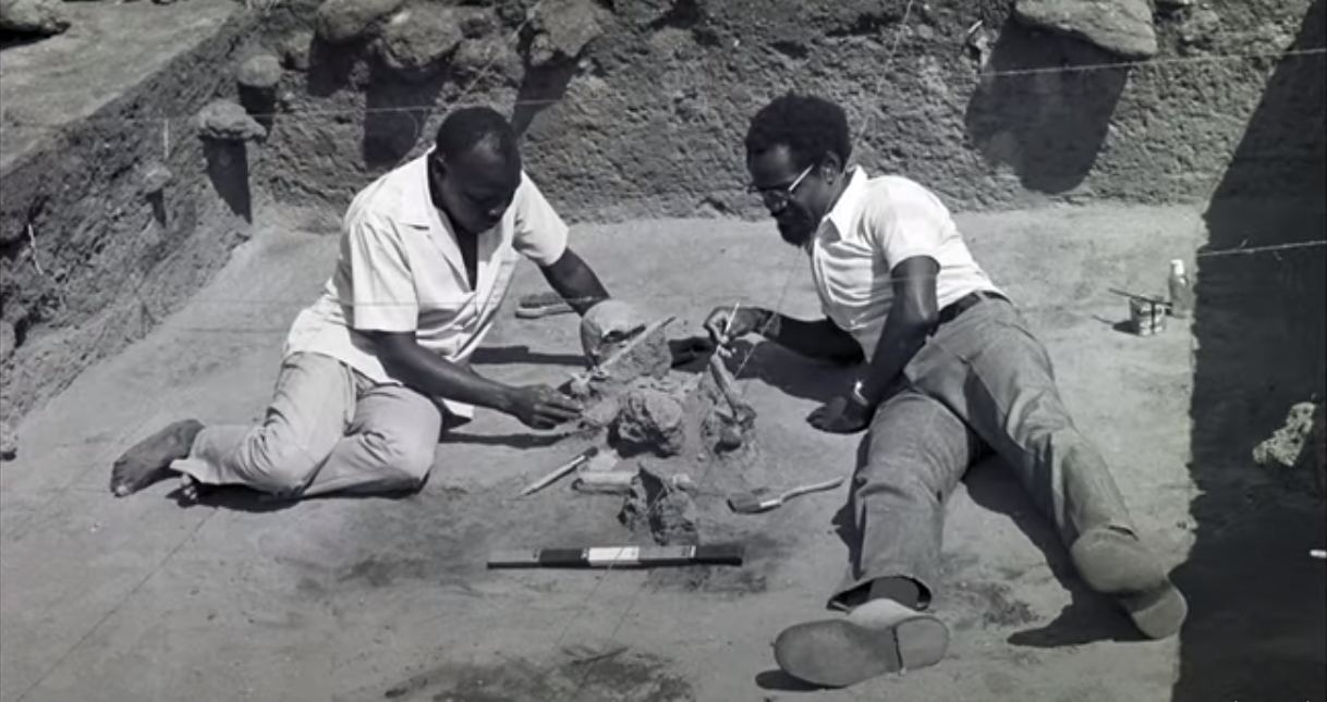 One of the photos displayed at the Fort Jesus Museum exhibition showing Kamoya Kimeu and John Onyango Abuje, two prominent Kenyan archeologists, excavating a neolithic burial site. Image credits: National Museums of Kenya