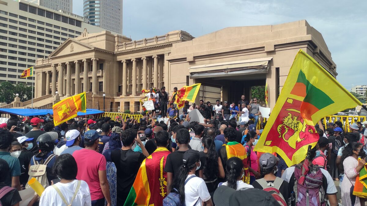 Protests against President Gotabaya Rajapaksa near the Presidential Secretariat (2022). Image via Wikimedia Commons by AntanO. CC BY-SA 4.0